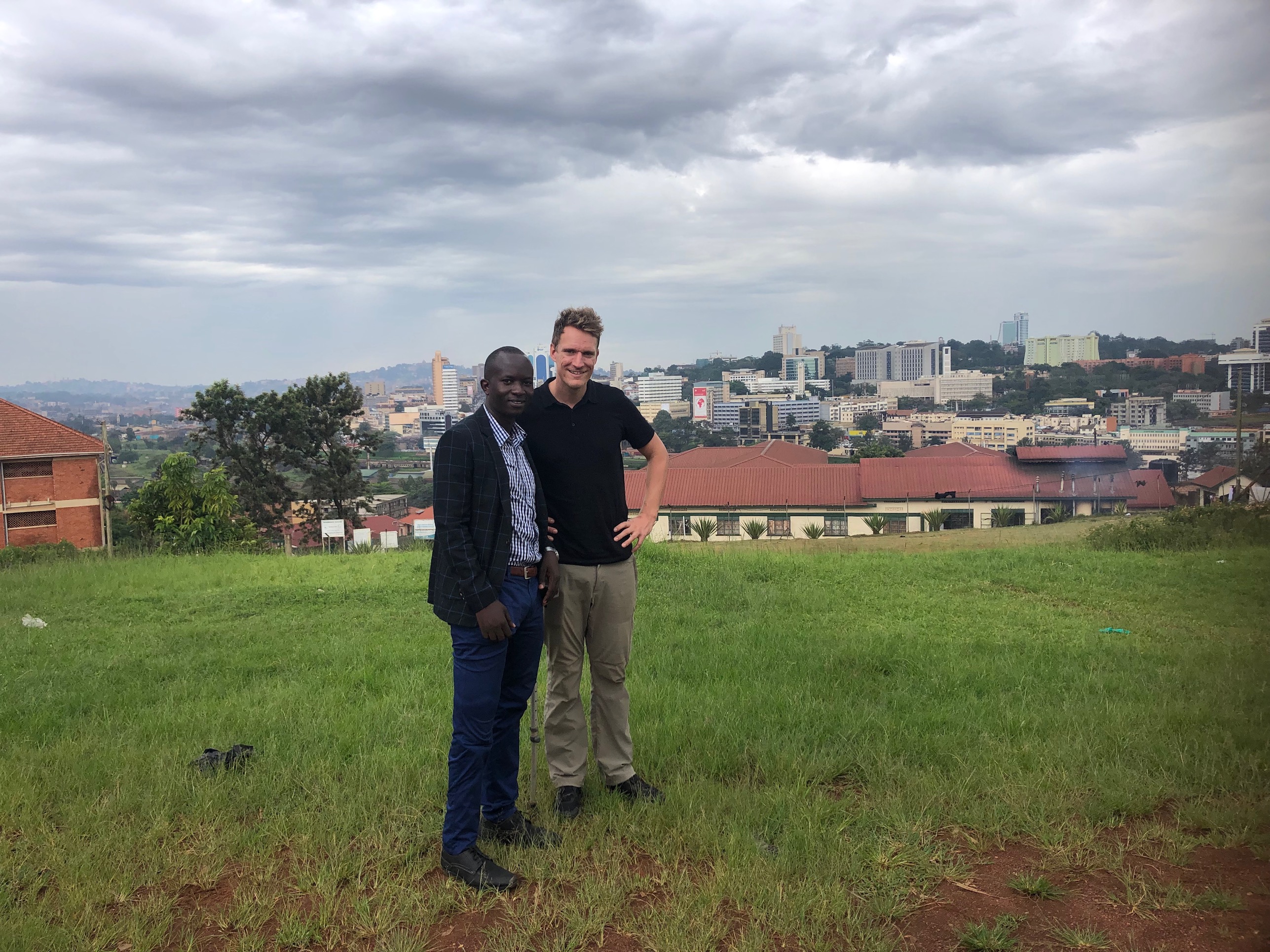 Paul and JH with view on Kampala (capital Uganda)